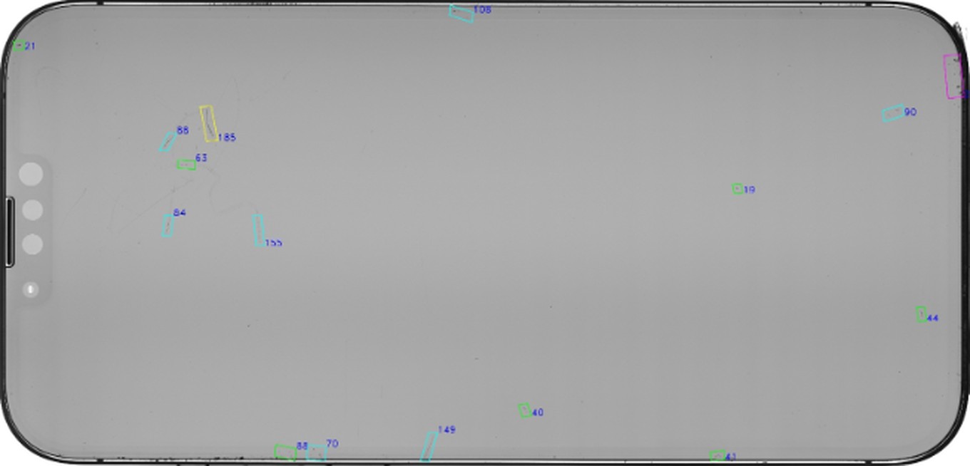 Vision capture of the same display before polishing, with scratches outlined across the glass